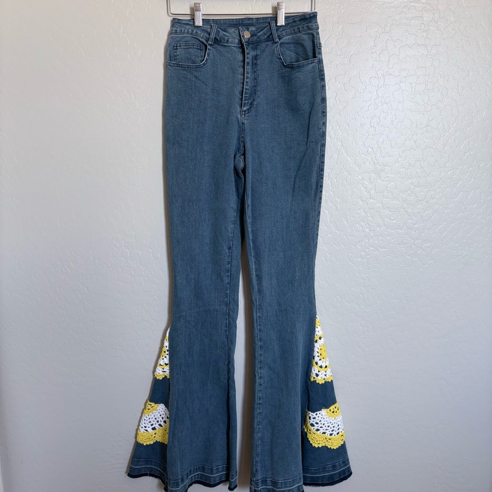 Three bird nest flared denim jeans